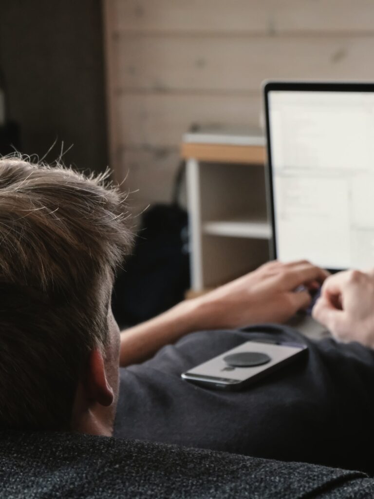 man using laptop